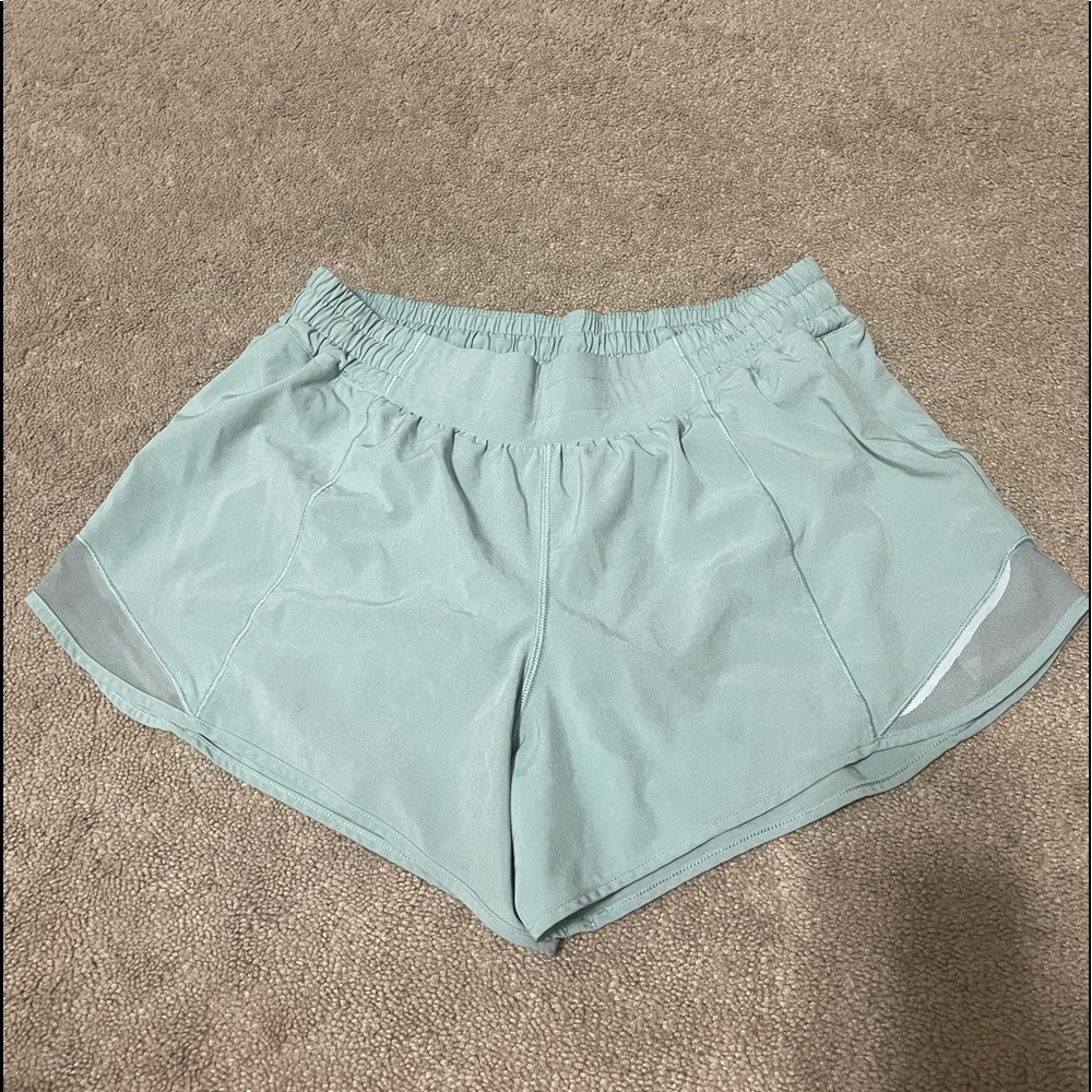 Lululemon shorts size 10. 4 inch low rise. Light blue shorts